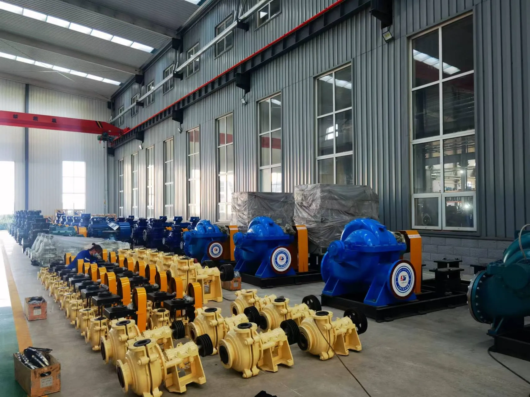 SAH-series slurry pumps lined up in the workshop before despatch