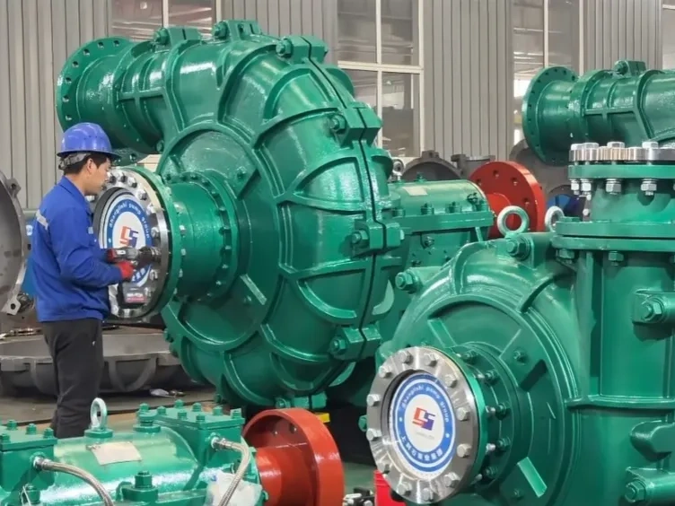 Fitter mounting the cover plate onto an SZP-series pump